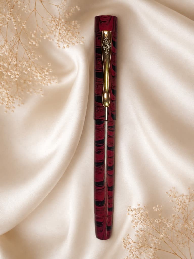 PRAVAH Red Black Swirl Pen - Red Black Swirl handcrafted ebonite fountain pen by RS Writing Instruments